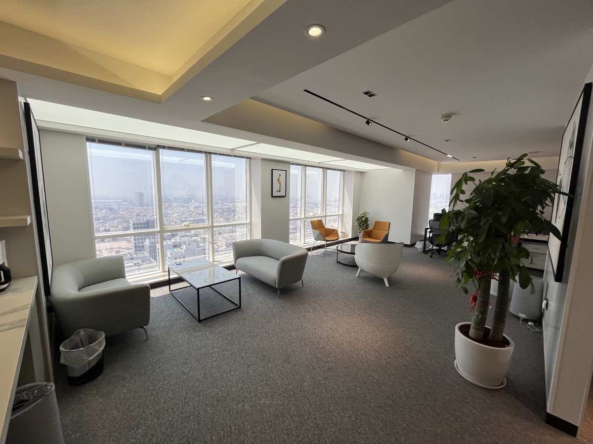 Open lounge and city-facing office space